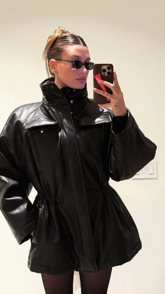 Hailey Bieber Wears Flattering Fit-and-Flare Leather Coat Dress on Date Night With Justin Bieber